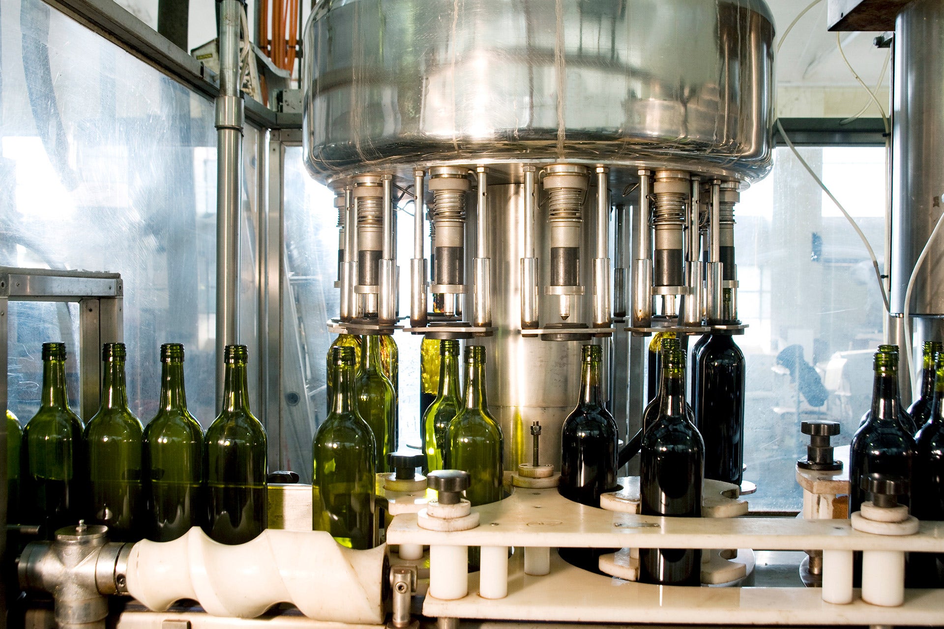 Wine being bottled by a machine