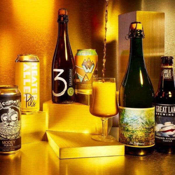 Selection of Top 50 Beers of 2021 on gold background