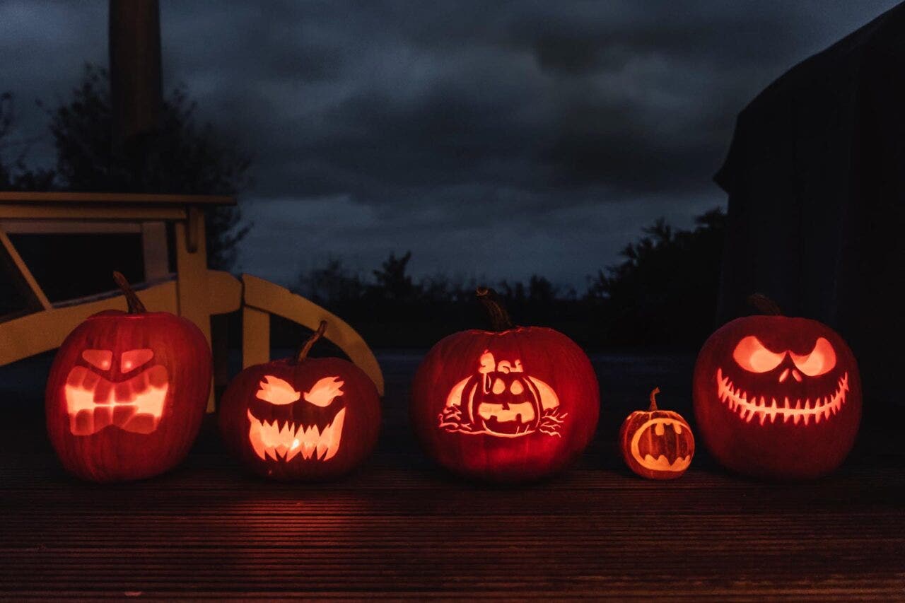 A row of carved pumpkins