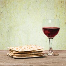 Passover background, wine and matzoh